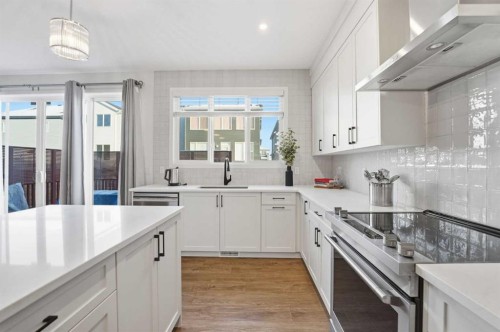 102 Setonstone Manor Se, Calgary, AB - Indoor Photo Showing Kitchen With Upgraded Kitchen