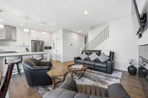 102 Setonstone Manor Se, Calgary, AB - Indoor Photo Showing Living Room
