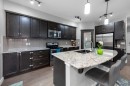 80 Legacy Reach Manor Se, Calgary, AB  - Indoor Photo Showing Kitchen With Stainless Steel Kitchen With Double Sink With Upgraded Kitchen 