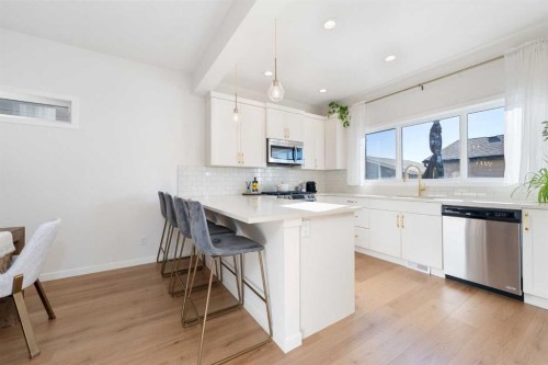 108 Masters Heights Se, Calgary, AB - Indoor Photo Showing Kitchen With Stainless Steel Kitchen With Upgraded Kitchen