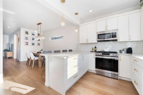 108 Masters Heights Se, Calgary, AB - Indoor Photo Showing Kitchen With Upgraded Kitchen