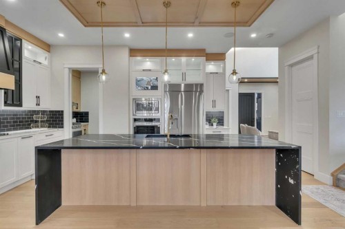 2012 Waterbury Road, Chestermere, AB - Indoor Photo Showing Kitchen With Upgraded Kitchen