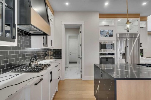 2012 Waterbury Road, Chestermere, AB - Indoor Photo Showing Kitchen With Upgraded Kitchen