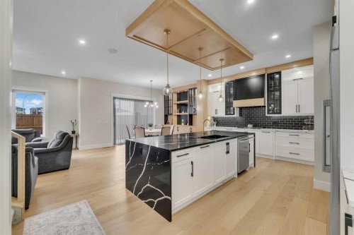 2012 Waterbury Road, Chestermere, AB - Indoor Photo Showing Kitchen With Upgraded Kitchen