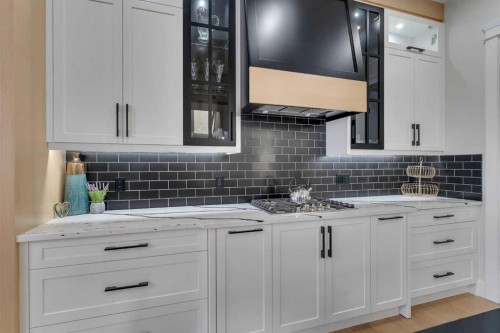 2012 Waterbury Road, Chestermere, AB - Indoor Photo Showing Kitchen With Upgraded Kitchen