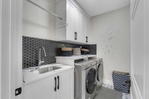 2012 Waterbury Road, Chestermere, AB - Indoor Photo Showing Laundry Room