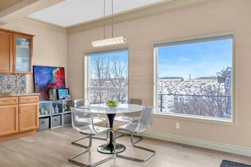 100 Cougarstone Manor Sw, Calgary, AB - Indoor Photo Showing Dining Room
