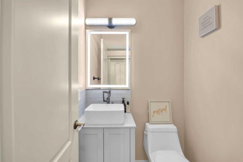 100 Cougarstone Manor Sw, Calgary, AB - Indoor Photo Showing Laundry Room