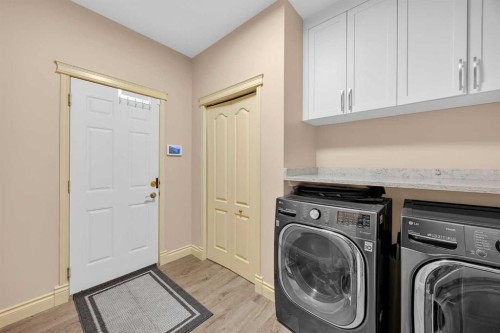 100 Cougarstone Manor Sw, Calgary, AB - Indoor Photo Showing Laundry Room