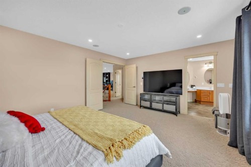 100 Cougarstone Manor Sw, Calgary, AB - Indoor Photo Showing Bedroom