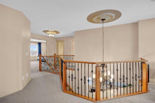 100 Cougarstone Manor Sw, Calgary, AB - Indoor Photo Showing Other Room