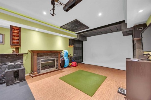 100 Cougarstone Manor Sw, Calgary, AB - Indoor With Fireplace