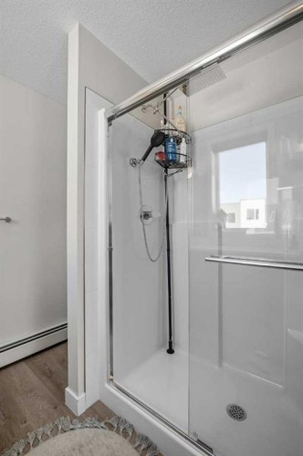 210-660 Shawnee Square Sw, Calgary, AB - Indoor Photo Showing Bathroom