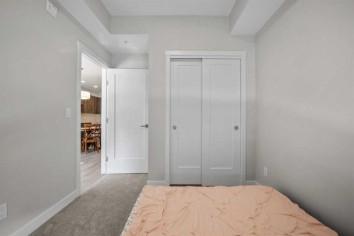 210-660 Shawnee Square Sw, Calgary, AB - Indoor Photo Showing Other Room