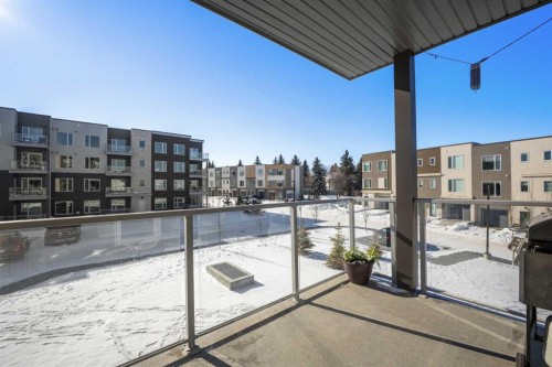 210-660 Shawnee Square Sw, Calgary, AB - Outdoor With Balcony