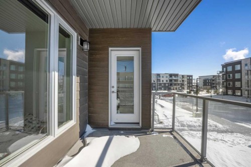 210-660 Shawnee Square Sw, Calgary, AB - Outdoor With Balcony With Exterior