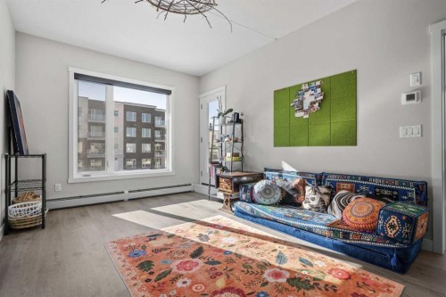 210-660 Shawnee Square Sw, Calgary, AB - Indoor Photo Showing Other Room