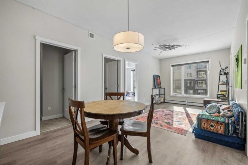 210-660 Shawnee Square Sw, Calgary, AB - Indoor Photo Showing Dining Room