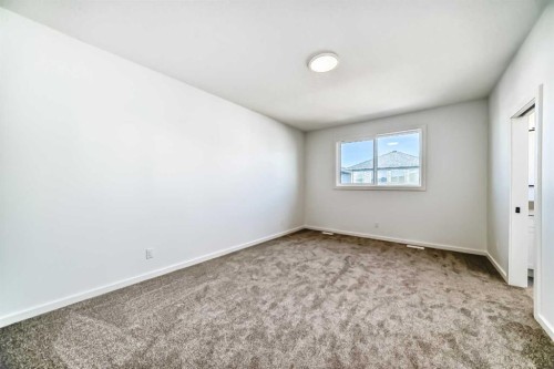 10 Rodelle Common Nw, Calgary, AB - Indoor Photo Showing Other Room