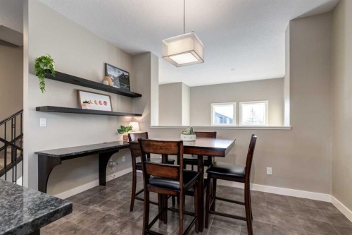 705 Evanston Square Nw, Calgary, AB - Indoor Photo Showing Dining Room