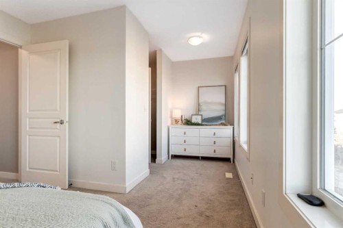 705 Evanston Square Nw, Calgary, AB - Indoor Photo Showing Bedroom