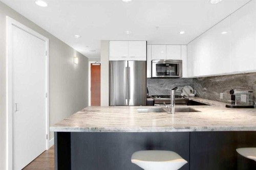 805-519 Riverfront Avenue Se, Calgary, AB - Indoor Photo Showing Kitchen With Stainless Steel Kitchen With Double Sink With Upgraded Kitchen