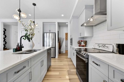 47 Walgrove Park Se, Calgary, AB - Indoor Photo Showing Kitchen With Stainless Steel Kitchen With Double Sink With Upgraded Kitchen