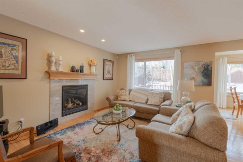 20 Tuscany Ridge Crescent Nw, Calgary, AB - Indoor Photo Showing Living Room With Fireplace