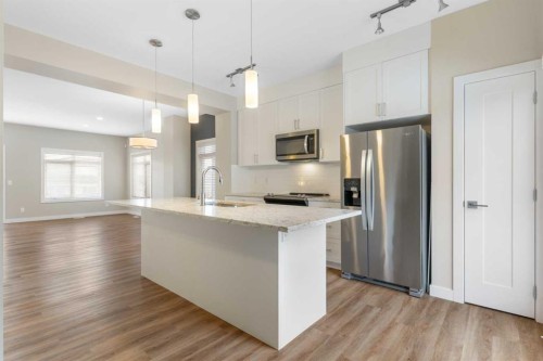 217 Sage Bluff Drive Nw, Calgary, AB - Indoor Photo Showing Kitchen With Upgraded Kitchen
