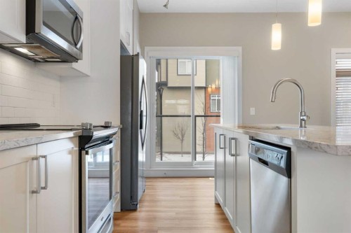 217 Sage Bluff Drive Nw, Calgary, AB - Indoor Photo Showing Kitchen With Upgraded Kitchen