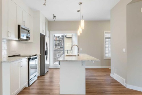 217 Sage Bluff Drive Nw, Calgary, AB - Indoor Photo Showing Kitchen With Upgraded Kitchen