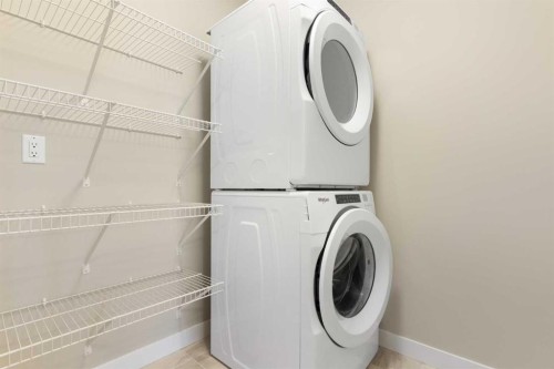 217 Sage Bluff Drive Nw, Calgary, AB - Indoor Photo Showing Laundry Room
