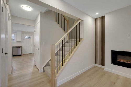 13 Penworth Close Se, Calgary, AB - Indoor With Fireplace
