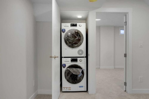 13 Penworth Close Se, Calgary, AB - Indoor Photo Showing Laundry Room