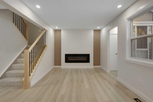 13 Penworth Close Se, Calgary, AB - Indoor With Fireplace