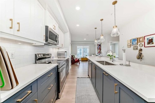 1205-220 Seton Grove Se, Calgary, AB - Indoor Photo Showing Kitchen With Upgraded Kitchen