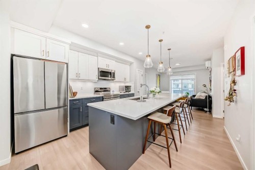 1205-220 Seton Grove Se, Calgary, AB - Indoor Photo Showing Kitchen With Upgraded Kitchen