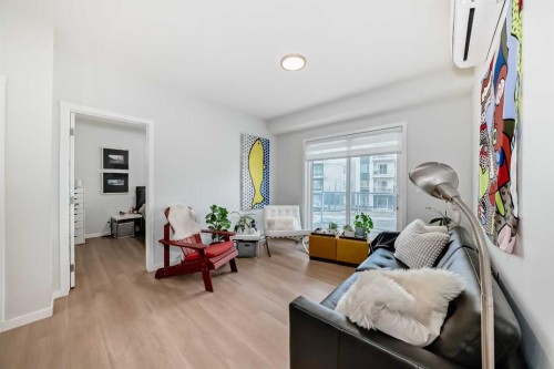 1205-220 Seton Grove Se, Calgary, AB - Indoor Photo Showing Living Room