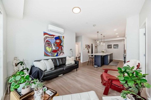 1205-220 Seton Grove Se, Calgary, AB - Indoor Photo Showing Living Room