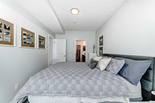 1205-220 Seton Grove Se, Calgary, AB - Indoor Photo Showing Bedroom
