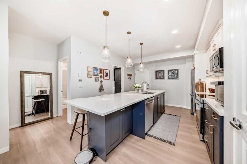 1205-220 Seton Grove Se, Calgary, AB - Indoor Photo Showing Kitchen With Upgraded Kitchen