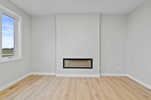 151 Belvedere Crescent Se, Calgary, AB - Indoor With Fireplace
