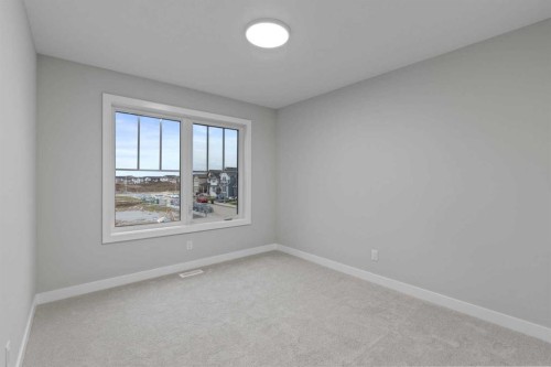 151 Belvedere Crescent Se, Calgary, AB - Indoor Photo Showing Other Room