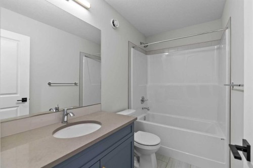 151 Belvedere Crescent Se, Calgary, AB - Indoor Photo Showing Bathroom