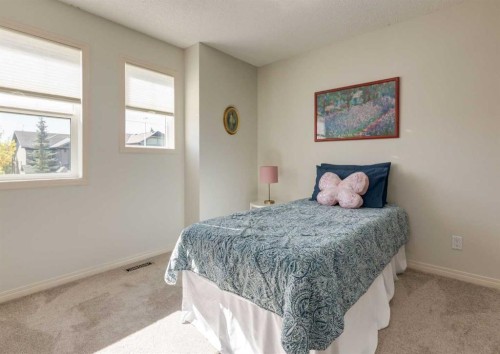 24 Silverado Saddle Court Sw, Calgary, AB - Indoor Photo Showing Bedroom