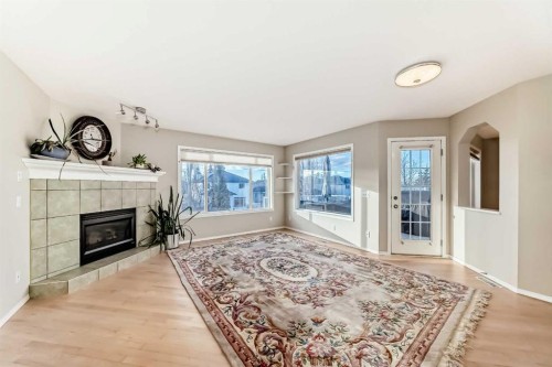 35 Citadel Ridge Close Nw, Calgary, AB - Indoor Photo Showing Living Room With Fireplace
