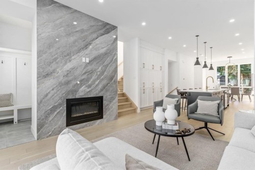 1445 28 Street Sw, Calgary, AB - Indoor Photo Showing Living Room With Fireplace