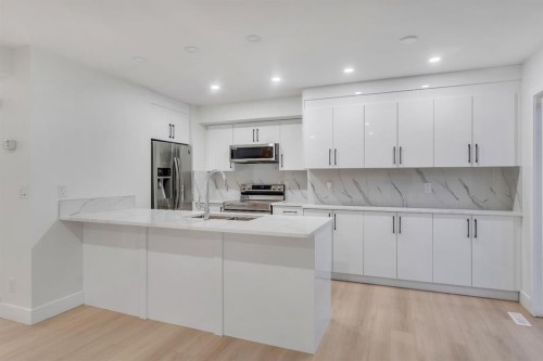 52 Saddlecreek Terrace Ne, Calgary, AB - Indoor Photo Showing Kitchen