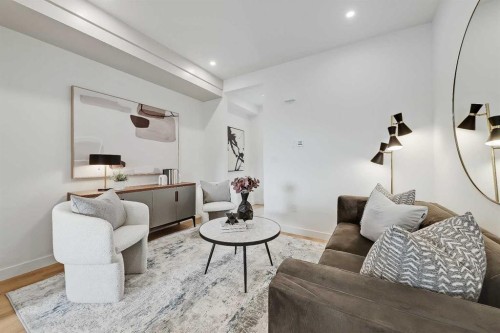 2-828 8 Avenue Ne, Calgary, AB - Indoor Photo Showing Living Room
