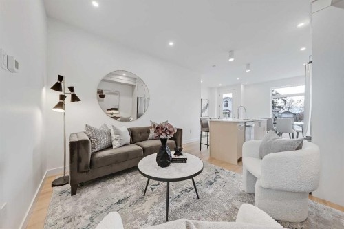 2-828 8 Avenue Ne, Calgary, AB - Indoor Photo Showing Living Room